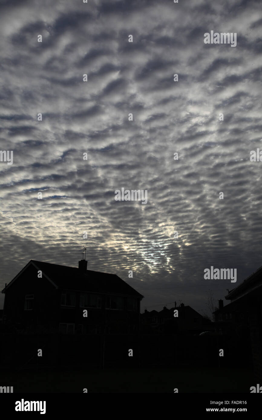 mackerel sky dappled with rows of small white fleecy typically