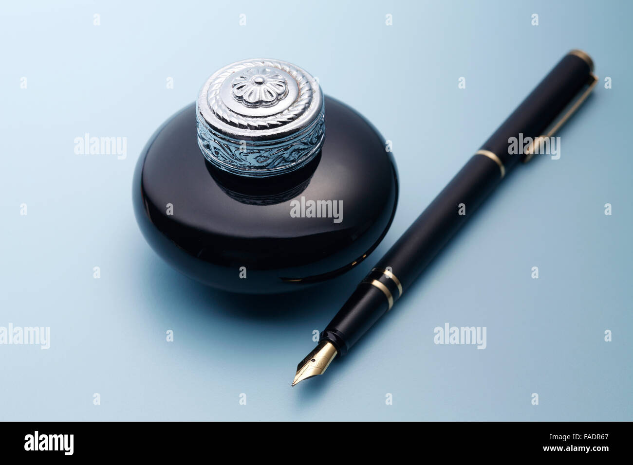 Fountain pen and ink well Stock Photo Alamy