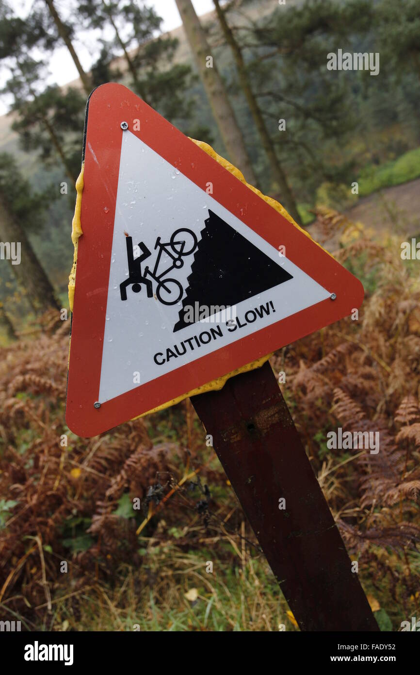 Steep Hill Sign in Forest Warning to Cyclists Stock Photo