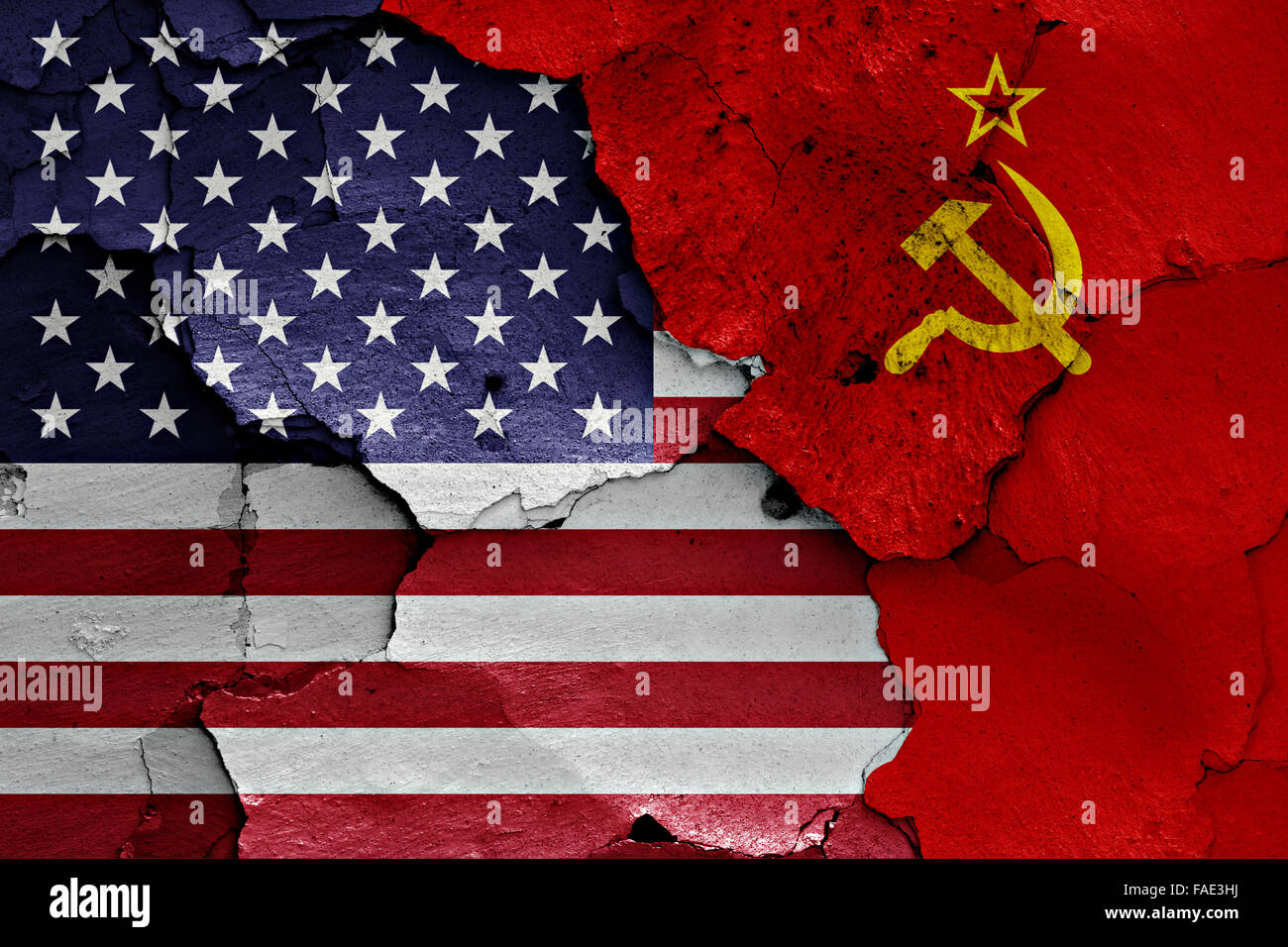 flags of USA and Soviet Union painted on cracked wall Stock Photo