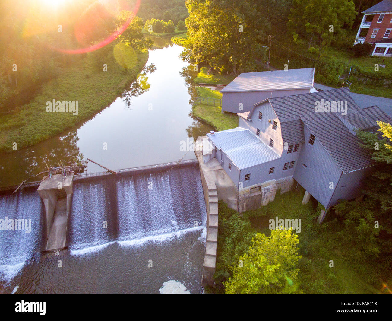 Sunset over a dam in Eden Mill, Maryland Stock Photo Alamy