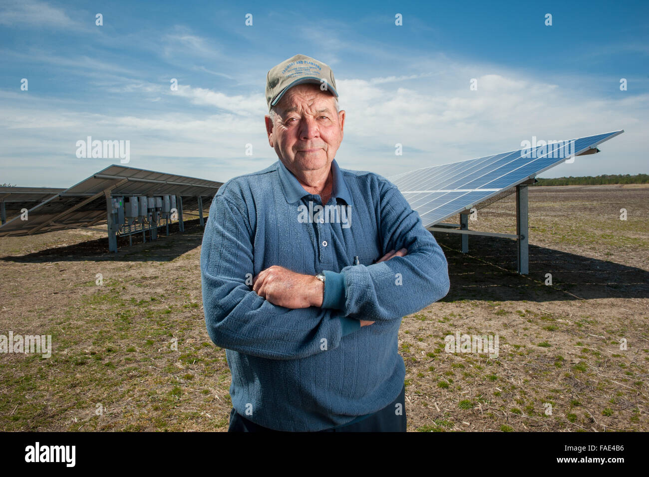 Farmer in front of his solar panel in Eden, MD Stock Photo