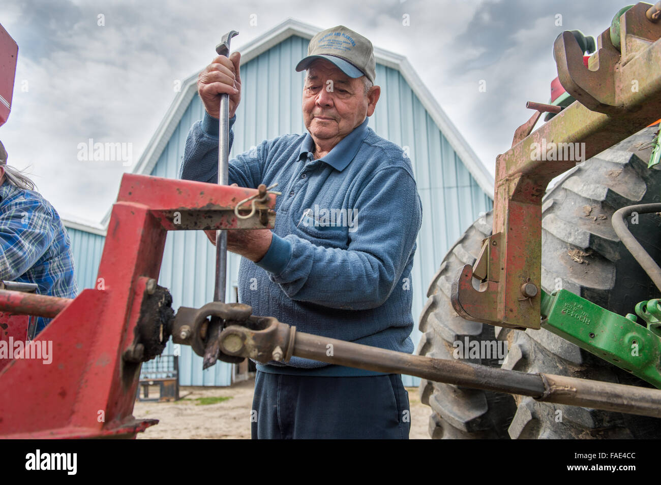 Farmer working on farming equipment in Eden, Maryland Stock Photo Alamy