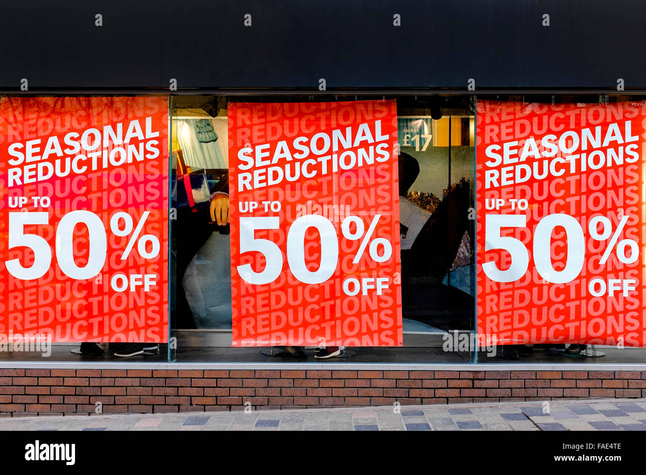 Sale posters in a shop window, Glasgow, Scotland, UK Stock Photo