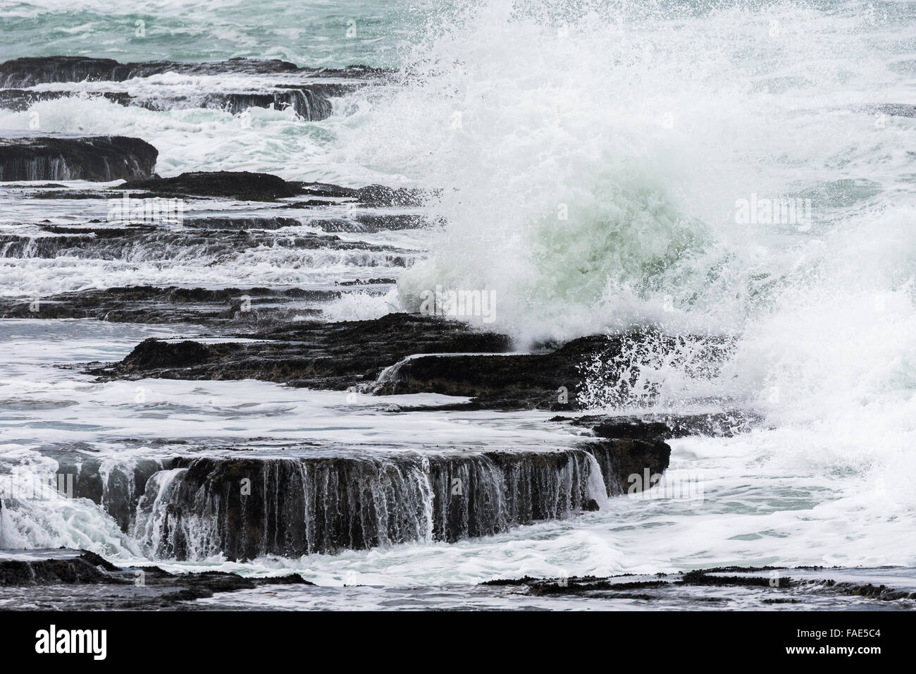 Sea crashing on to the rocks at Koppie Alleen beach, De Hoop nature reserve, Western Cape, South Africa Stock Photo