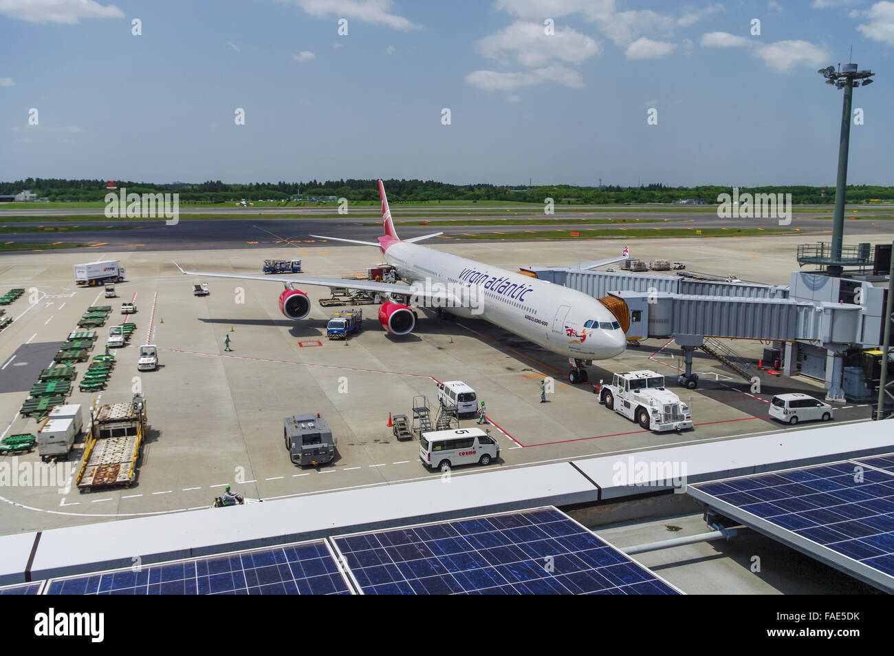 A Virgin Atlantic Airbus A340-600 airplane docked at Tokyo Narita International Airport, Japan. Stock Photo