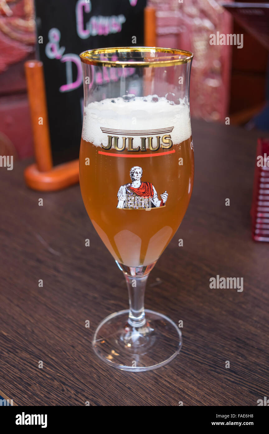 A glass of Julius beer, a Belgian strong pale ale brewed by the Hoegaarden brewery. Stock Photo