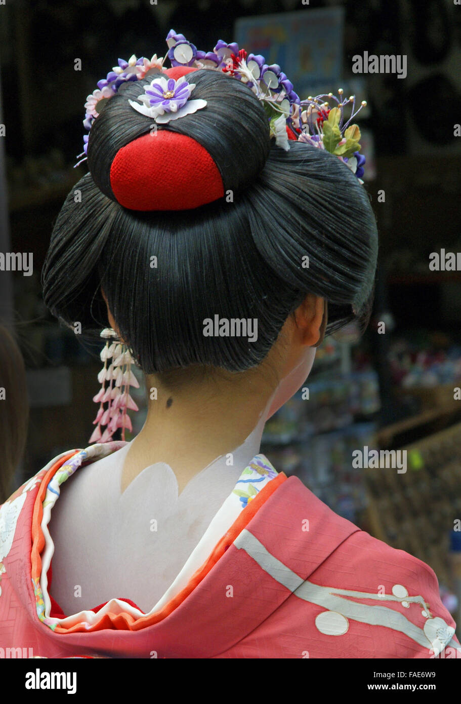 Japanese female dressed in traditional clothes in Kyoto Stock Photo