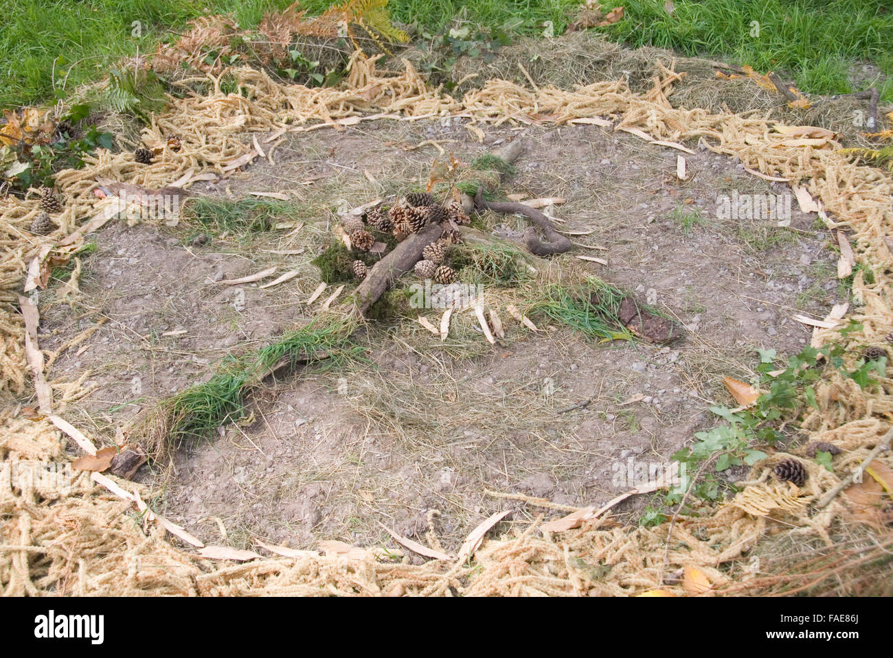 CHEPSTOW, WALES - July 2014: Mandala circle created with natural found items on 31 July at the Green Gathering Festival Stock Photo