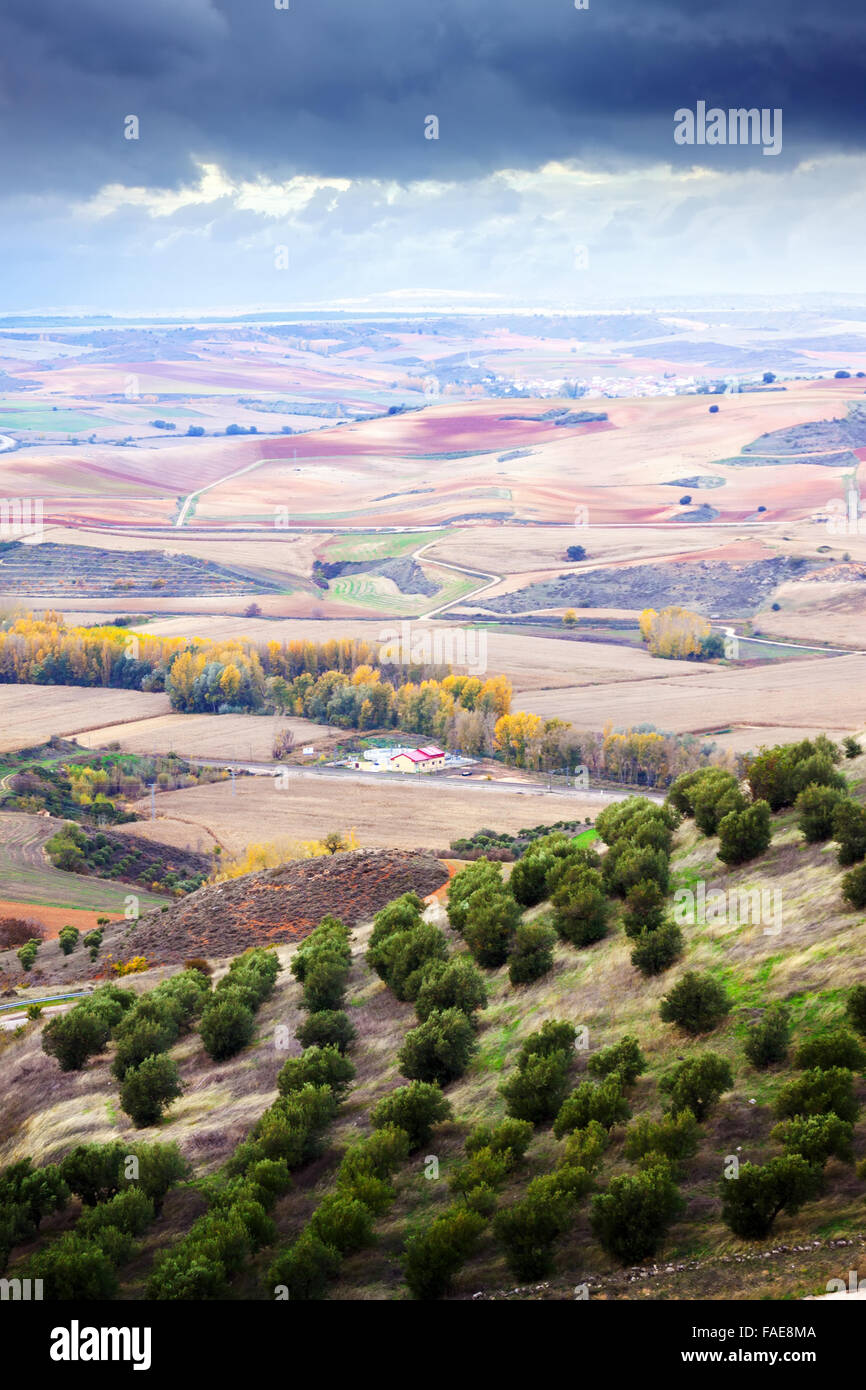 View down the hill at agricultural fields Stock Photo - Alamy