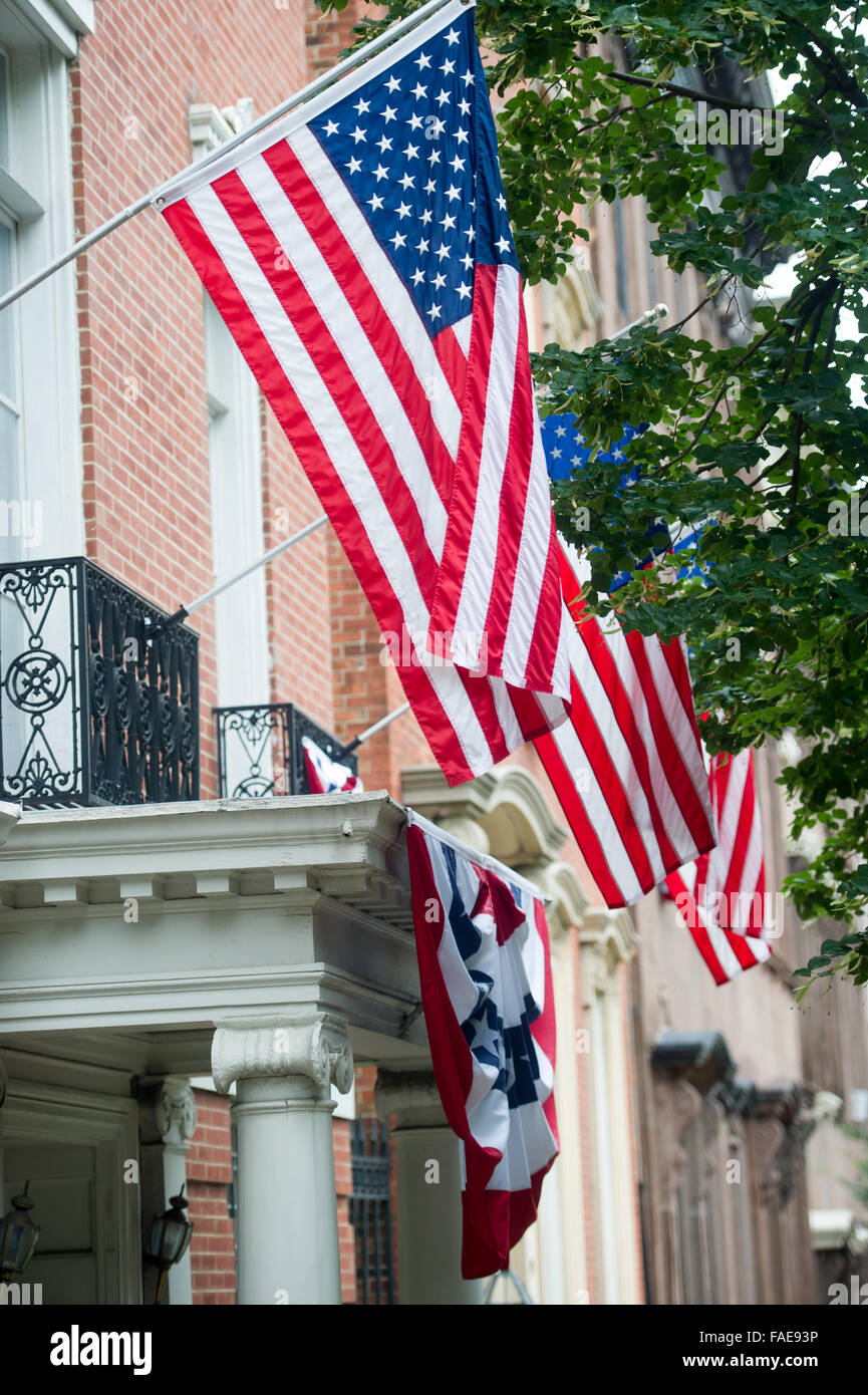 American flags displayed in front of a building Stock Photo Alamy