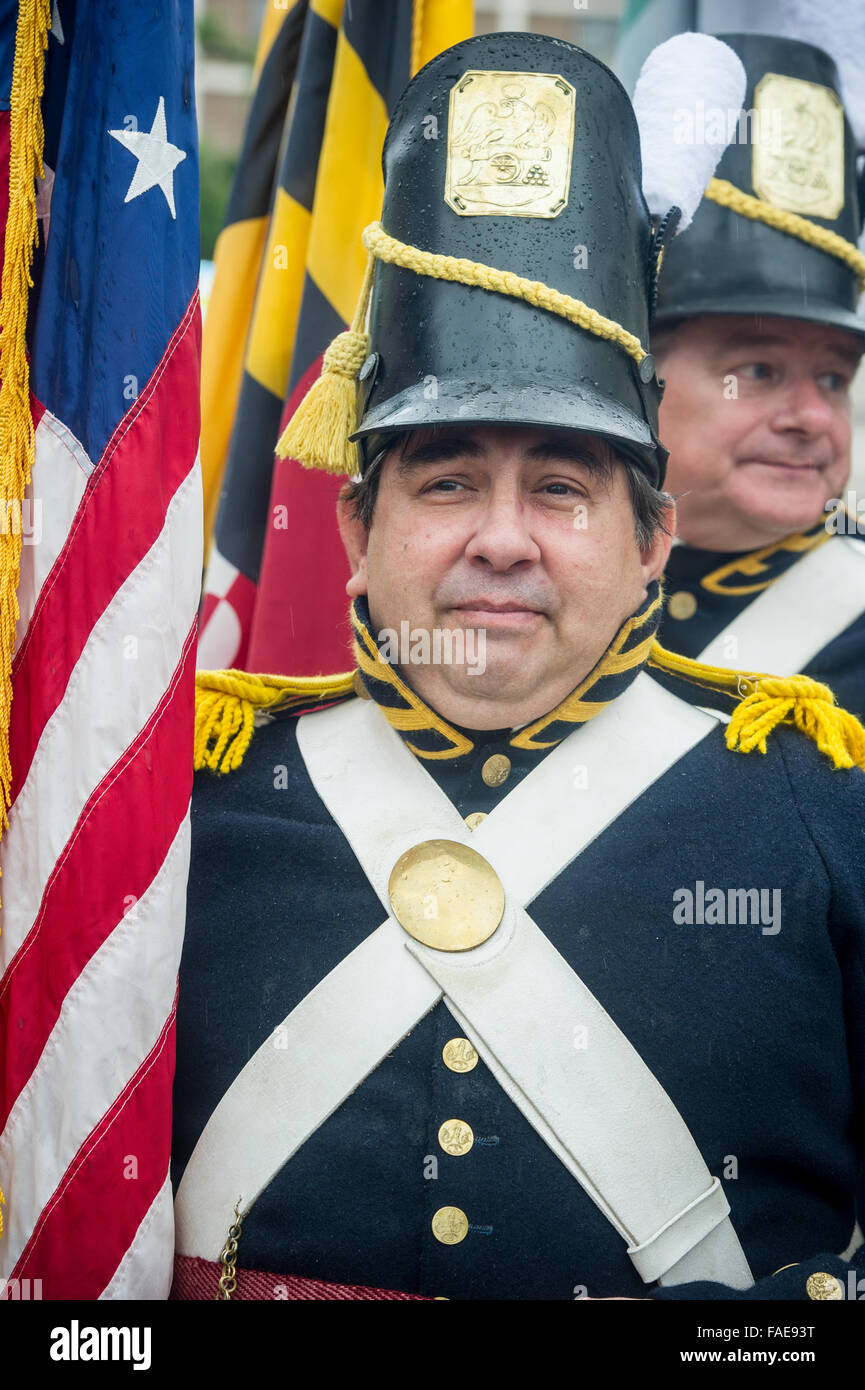 Man standing at attention in a period military costume Stock Photo