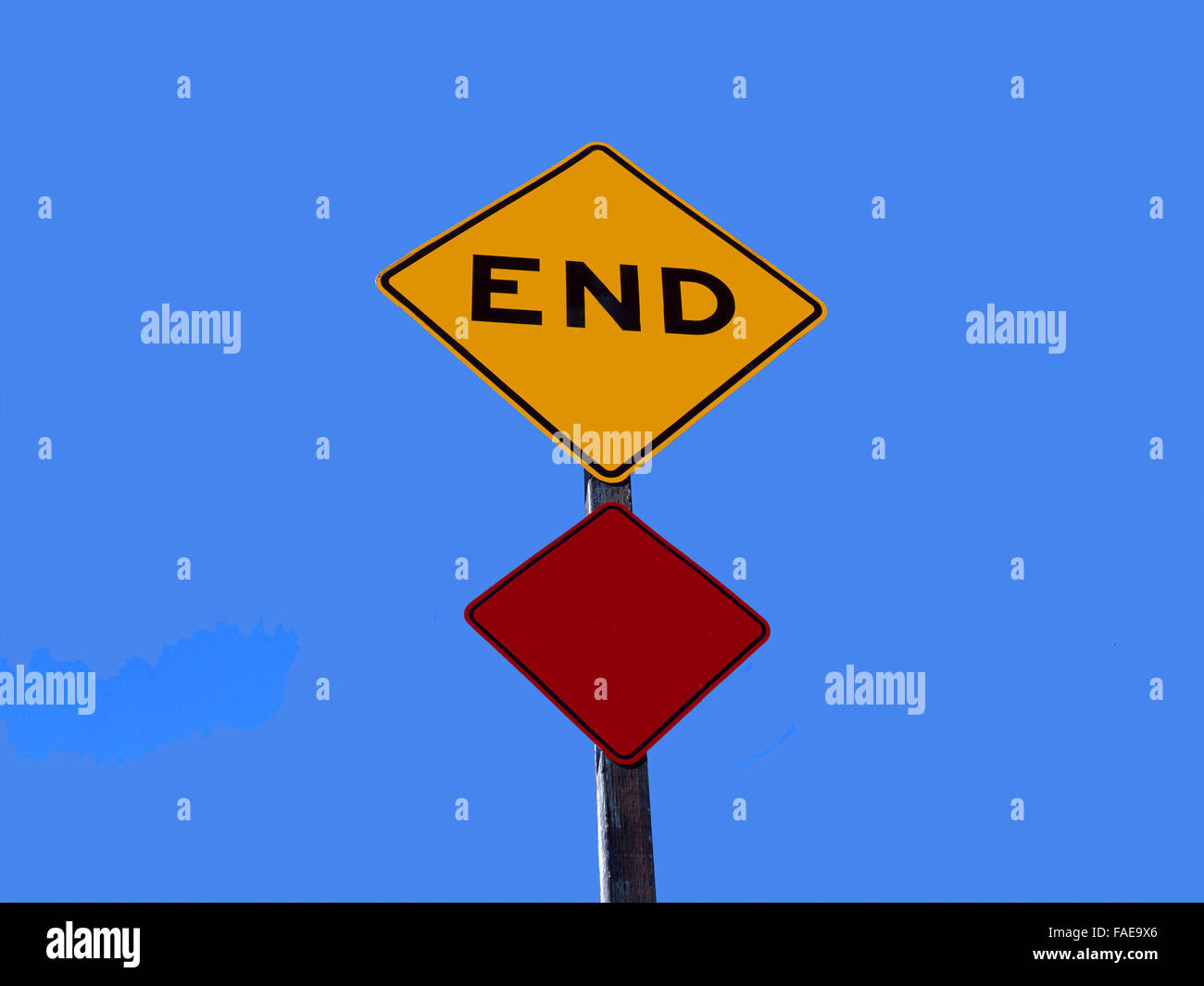 Traffic signs indicating the end of a road of a dead end street . Against clear blue sky. Stock Photo