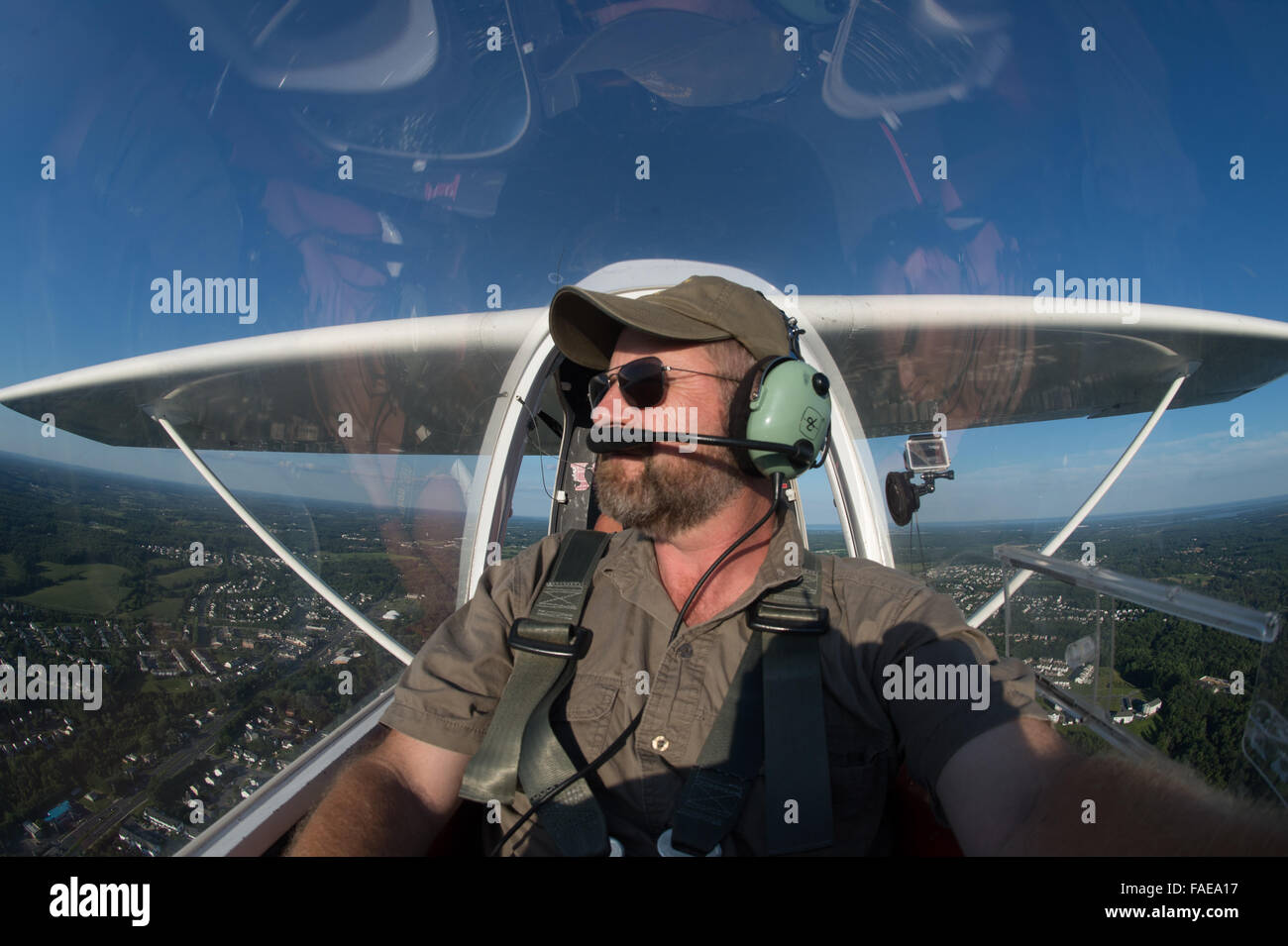 Pilot in the cockpit of an airplane. Stock Photo
