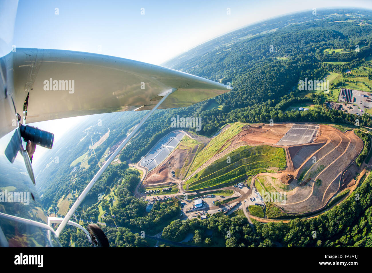 Airplane wing and aerial view of farmland in Harford County, Maryland Stock Photo