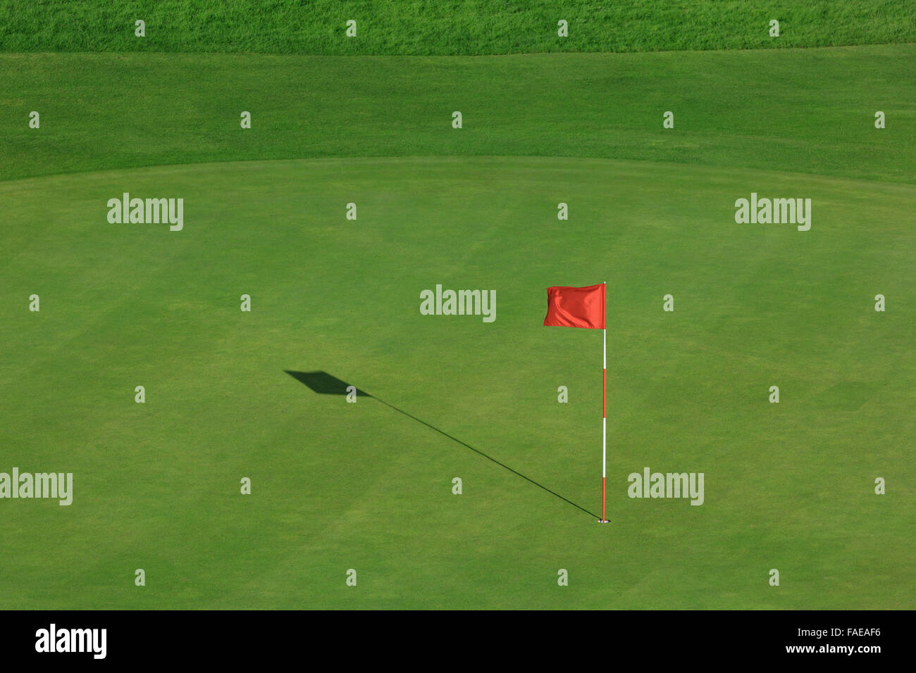 Golf field with red flag Stock Photo Alamy