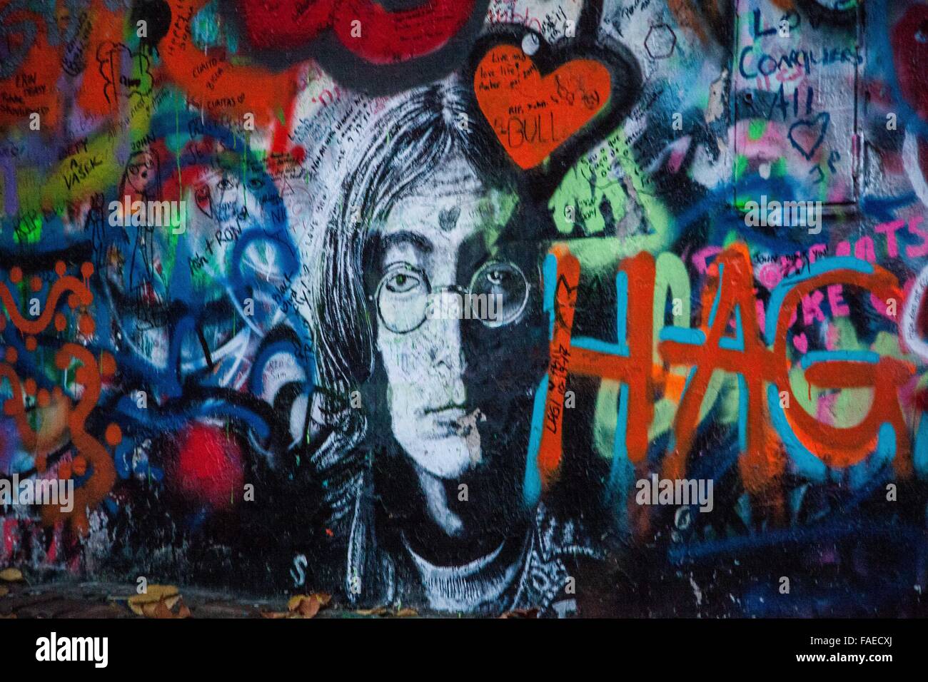 Lennon Wall Prague Czeck Republic, graffiti public art, street mural decorated by local unnamed artist with mirror and paint Stock Photo