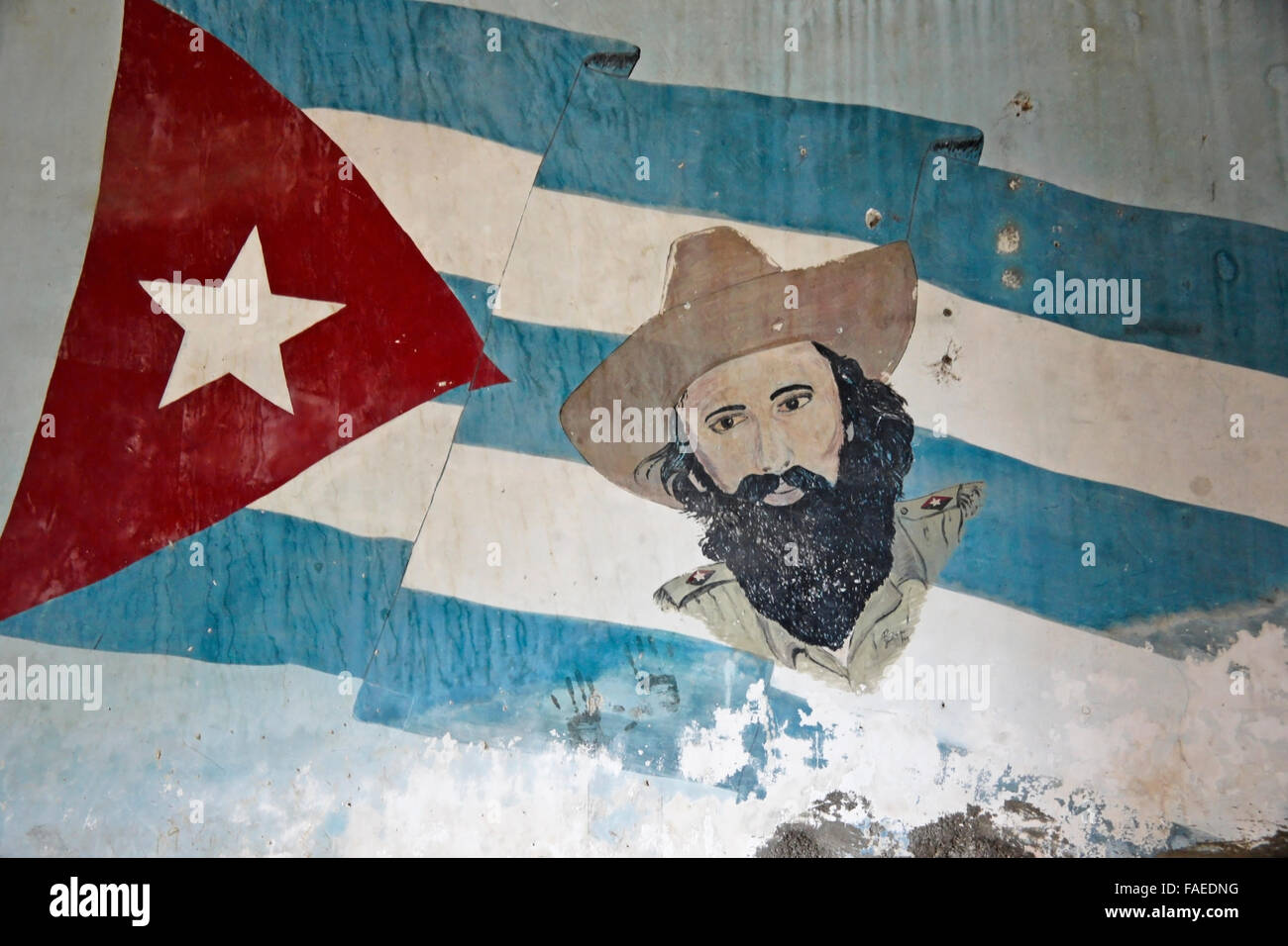 Mural of revolutionary Camilio Cienfuegos and Cuban flag, Havana, Cuba Stock Photo