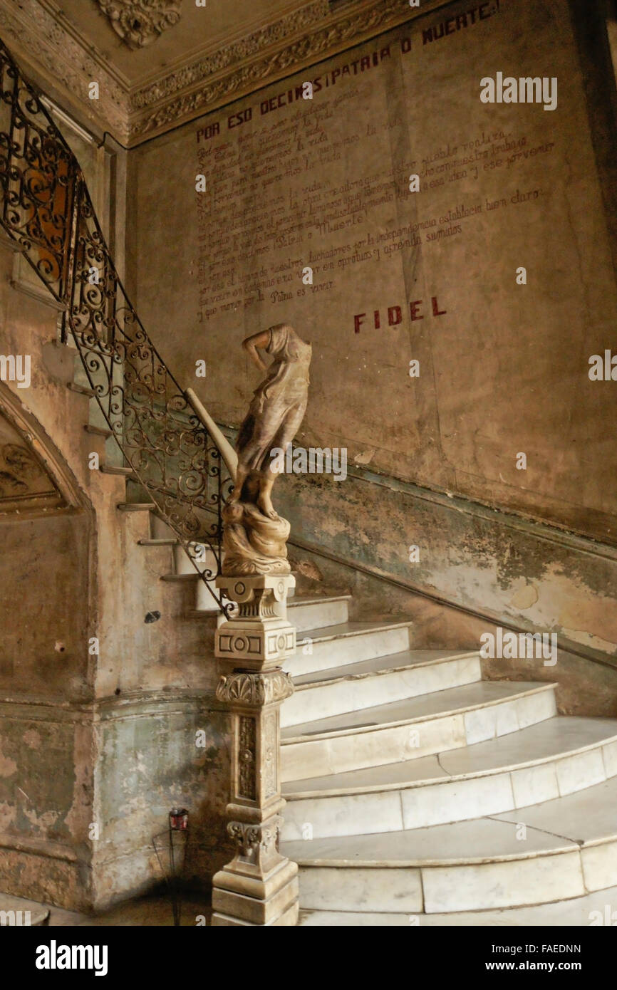 Marble staircase and political poem in lower lobby of La Mansion Camaguey (La Guarida building), Havana, Cuba Stock Photo
