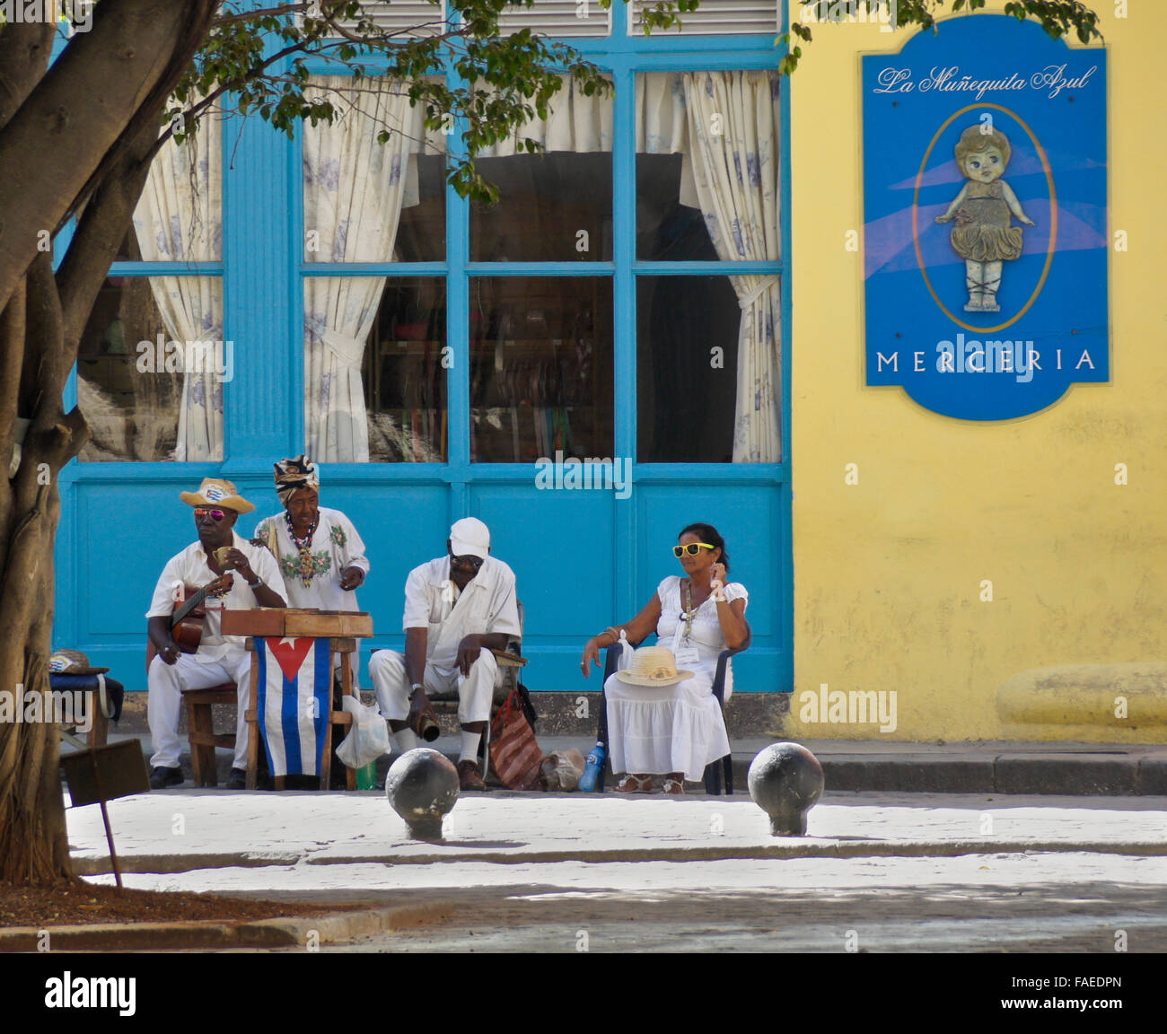Musical group playing outside a shop in Habana Vieja (Old Havana), Cuba Stock Photo
