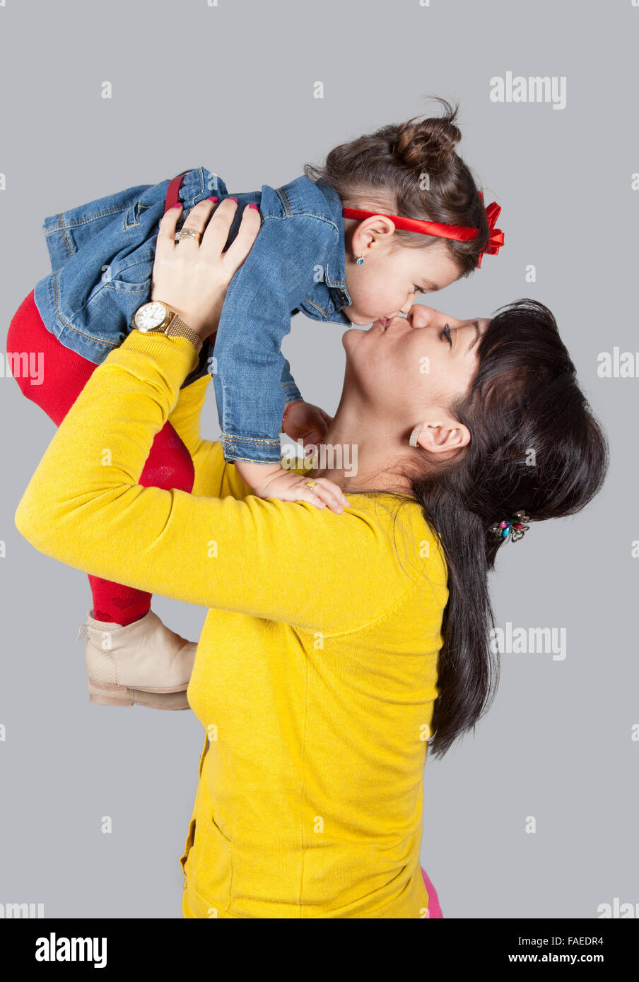 Mother with daughter, 18 months old, happy, studio shot Stock Photo Alamy