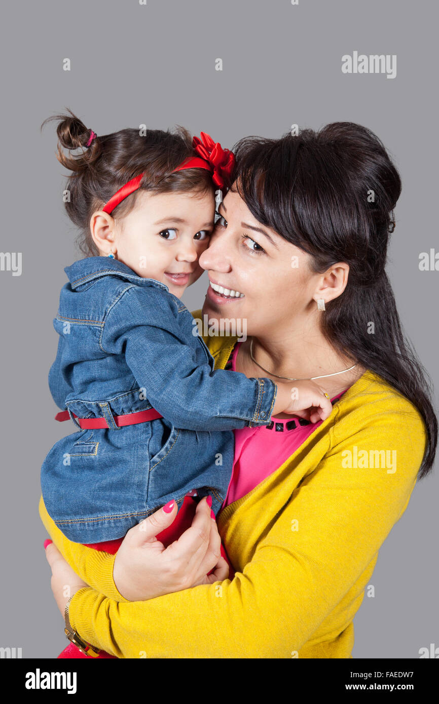 Mother with daughter, 18 months old, happy, studio shot Stock Photo Alamy
