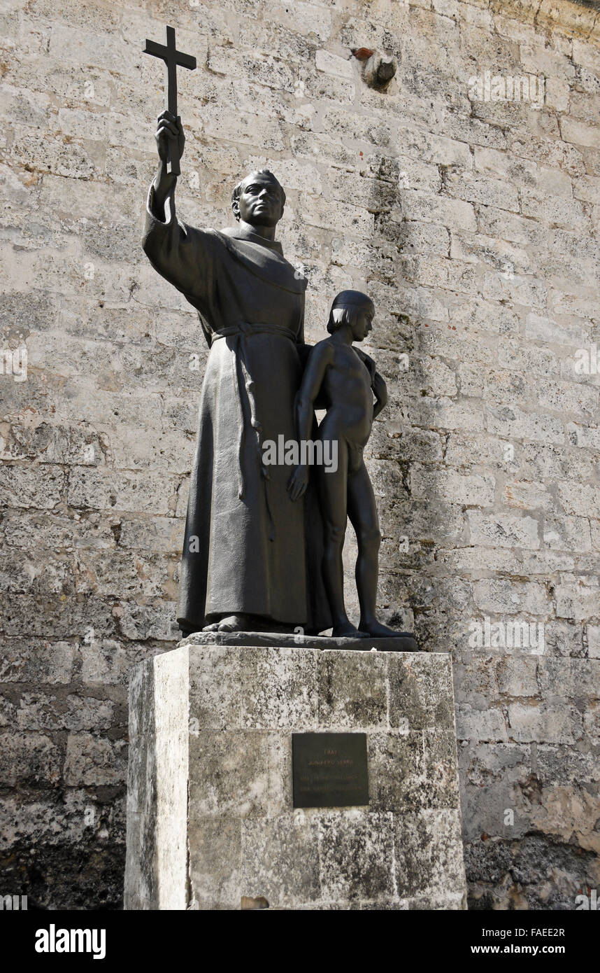 Statue of Franciscan Father Junipero Serra and Indian boy, Plaza de San Francisco, Habana Vieja (Old Havana), Cuba Stock Photo