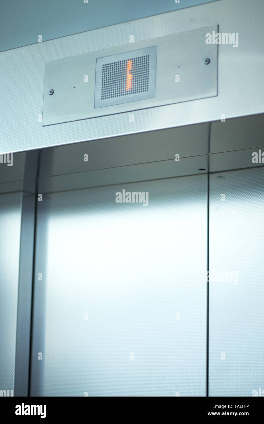 Metal elevator lift doors in airport lounge photo Stock Photo Alamy
