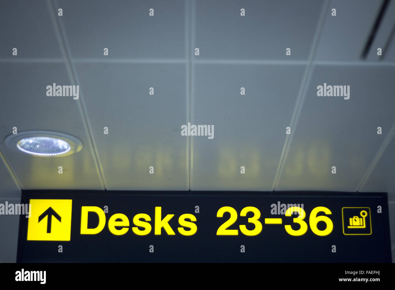 Airport desks information sign light panel giving directions in