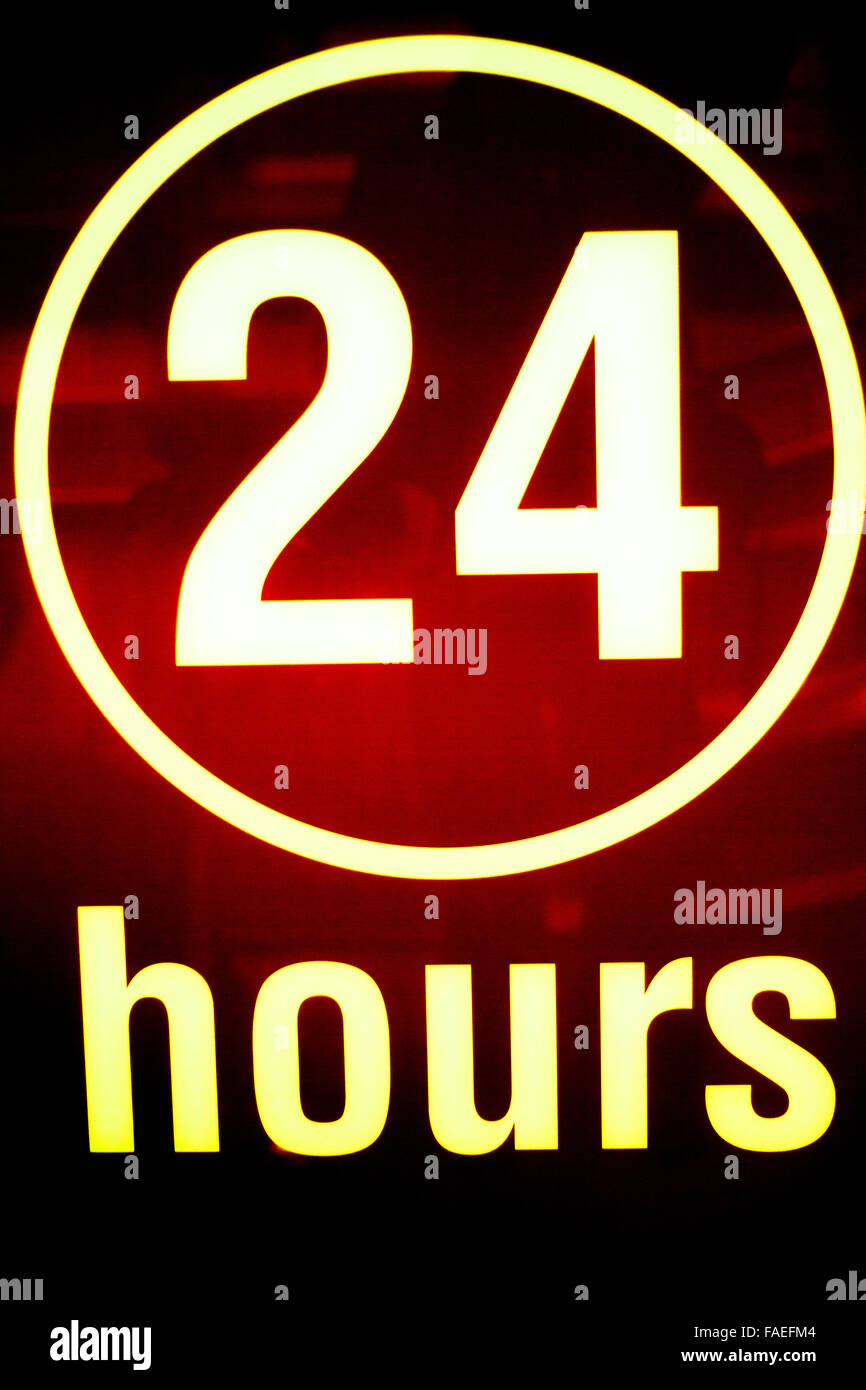Twenty four 24 hours open sign light in store Stock Photo Alamy