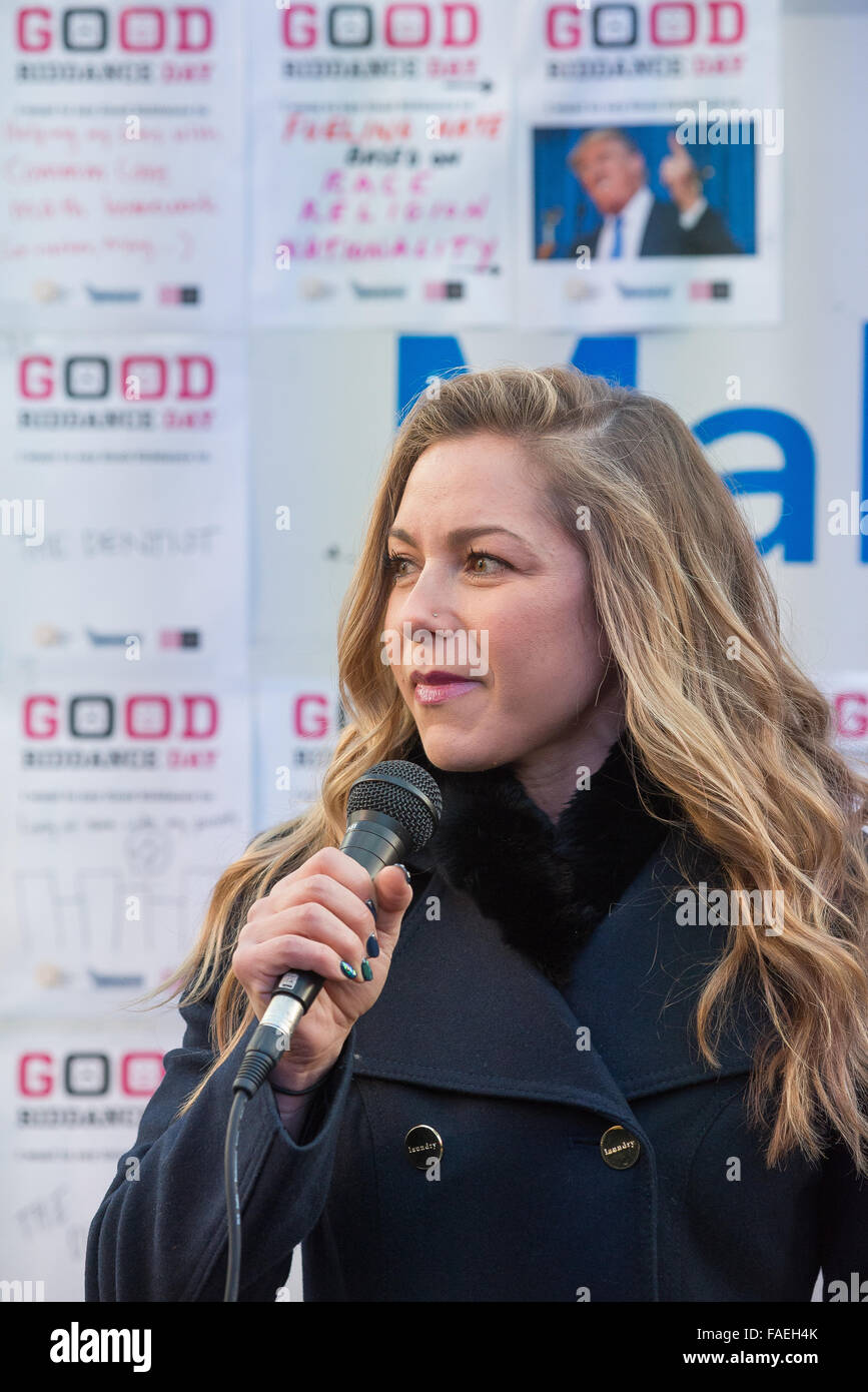 New York, USA. 28th Dec, 2015. Alison Hagendorf, host for this year's Good Riddance Day, speaks to the audience. In advance of the New Year, Times Square Alliance hosted the ninth rendition of its annual 'Good Riddance Day,' where the public is invited to symbolically shred letters, photos, or written messages conveying unpleasant memories from 2015. Hosted by media personality Alison Hagendorf and featuring brief comments by Times Square Alliance President Tim Tompkins, the event, sponsored by the document destruction company Shred-It, drew hundreds of participants from the public. © PACIFIC  Stock Photo