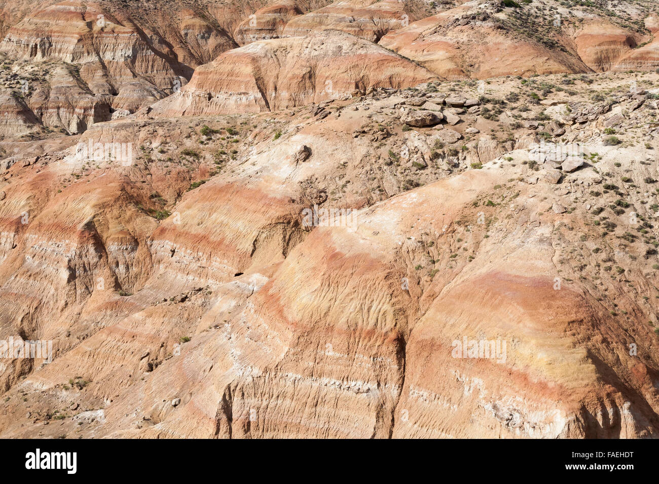 Eroded badlands create abstract shapes in the Bighorn Basin in north-central Wyoming. Stock Photo