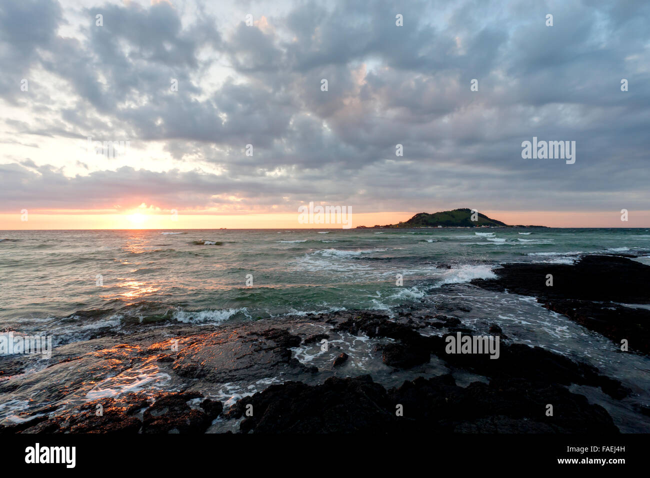 Sunset seascape and volcano, Jeju Island, Korea. Stock Photo