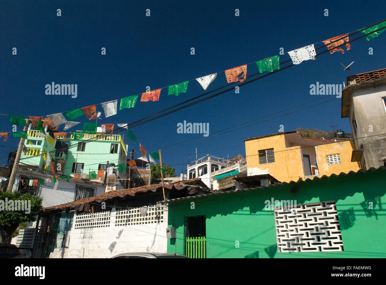 Colorful flags and banners above streets of Acapulco, Mexico Stock Photo