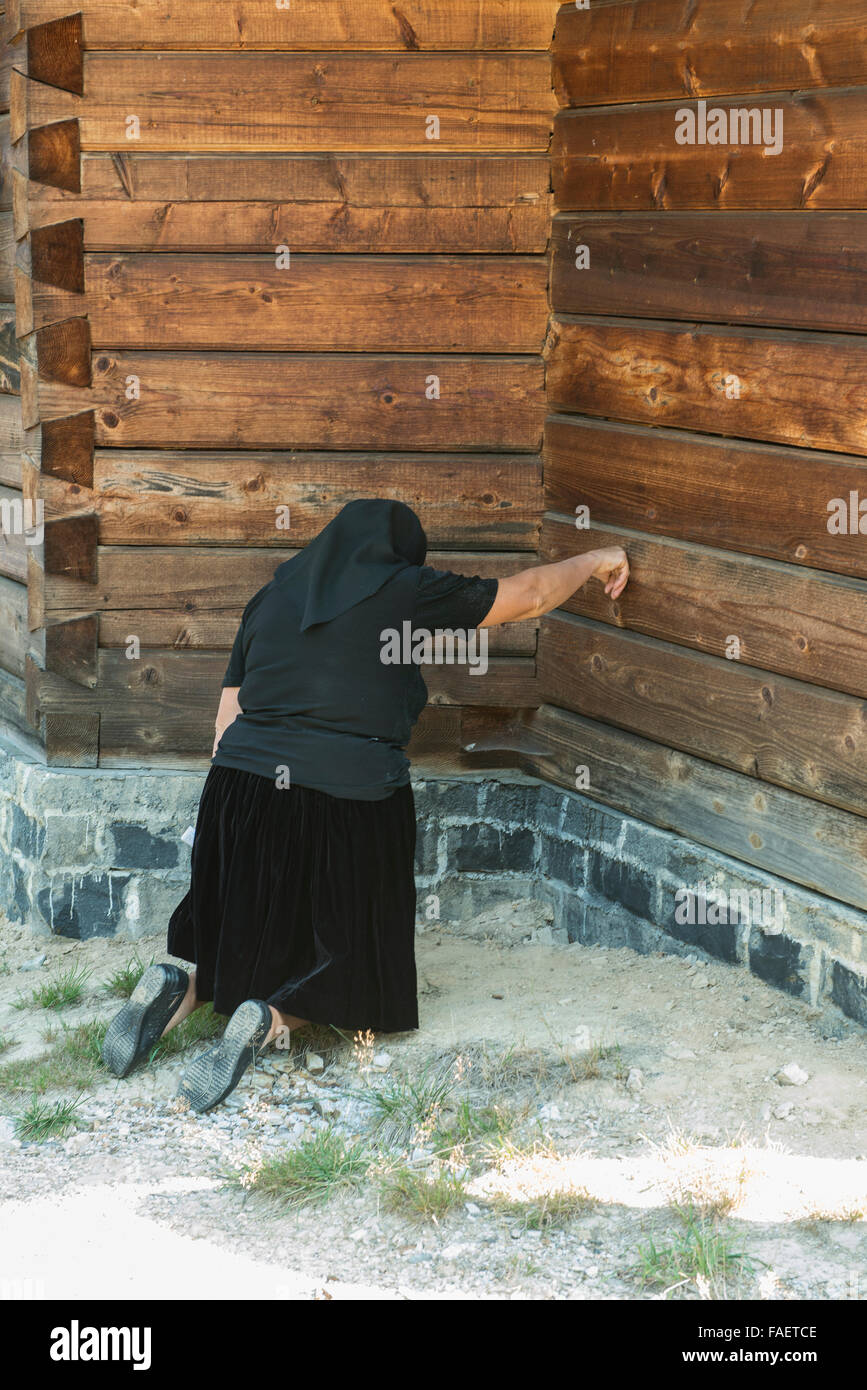 Woman kneeling in prayer on hi-res stock photography and images - Alamy