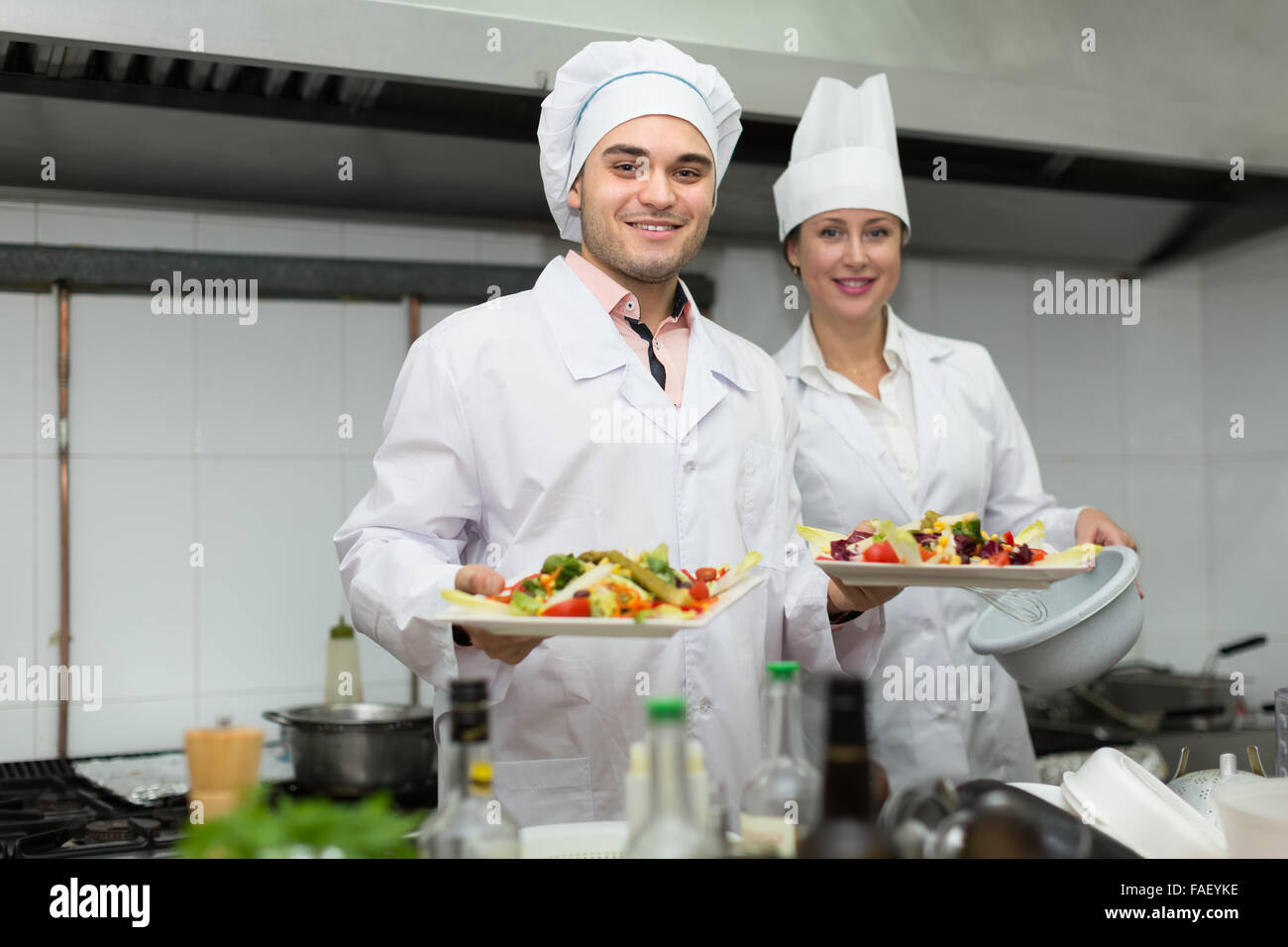 Positive smiling chef assistant hi-res stock photography and images - Alamy