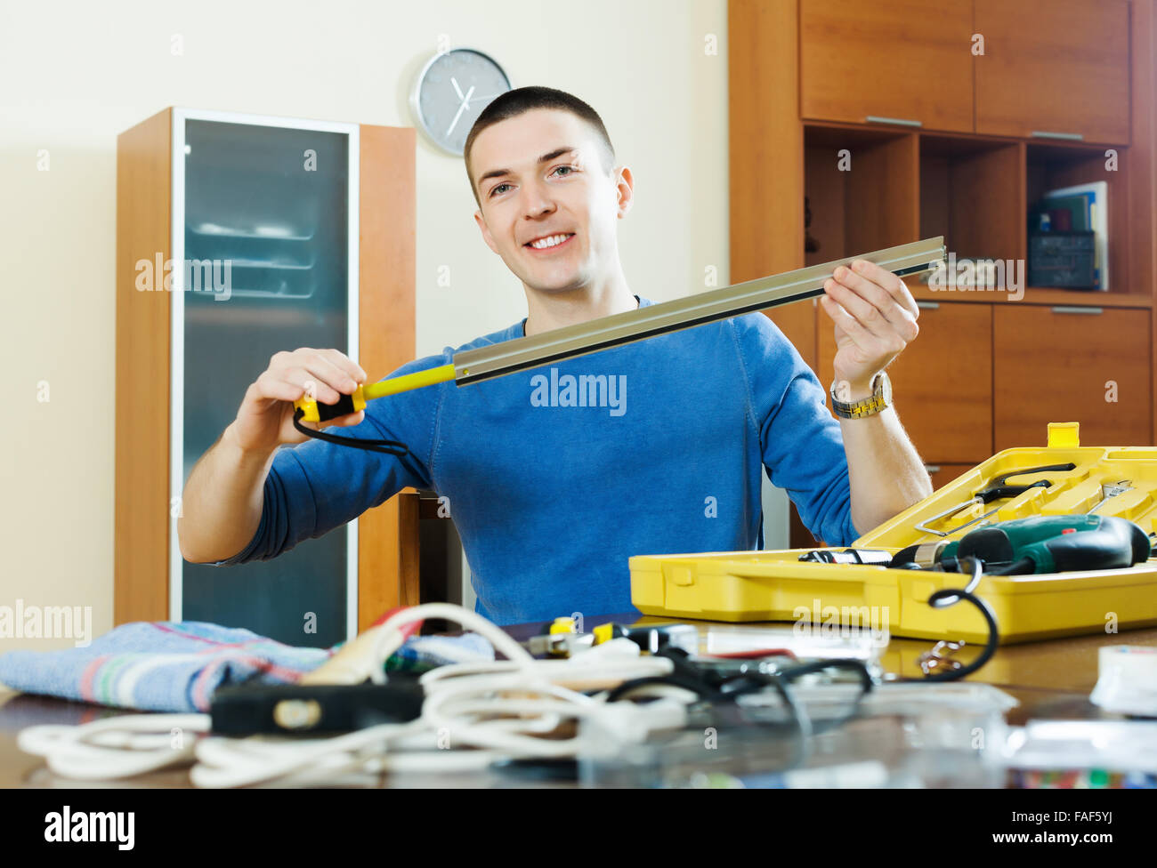 Happy family doing diy hi-res stock photography and images - Alamy