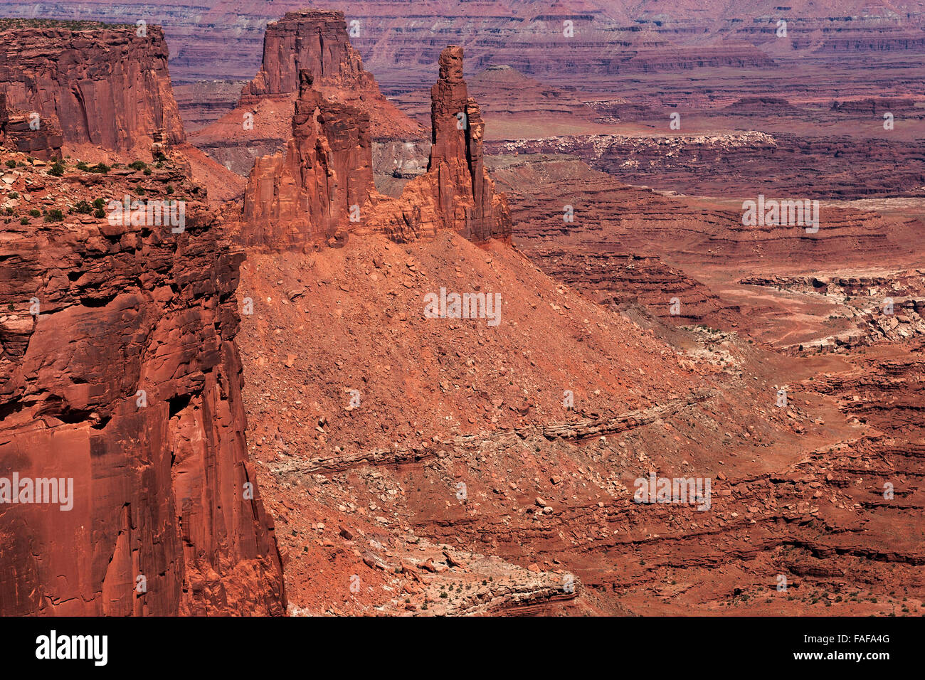 View of eroded landscape from Mesa Arch, rock formations, Island in the Sky, Canyonlands National Park, Utah, USA Stock Photo