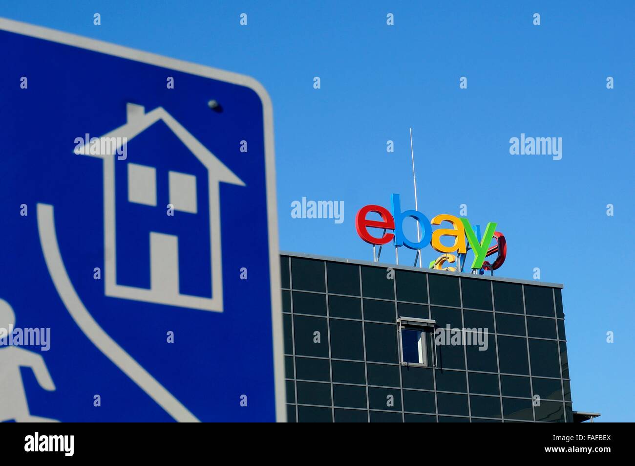 Kleinmachnow, Germany. 03rd Nov, 2015. The German branch of online auction company 'Ebay' behind a traffic sign of a low traffic area in the industrial estate 'Europarc Dreilinden' in Kleinmachnow, Germany, 03 November 2015. Photo: S. Steinach - NO WIRE SERVICE -/dpa/Alamy Live News Stock Photo