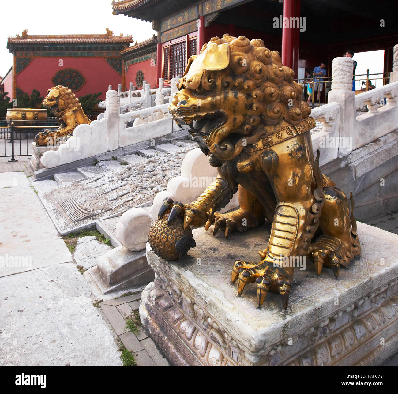 Golden Lions and Imperial Palace in the Forbidden City in Beijing China Stock Photo