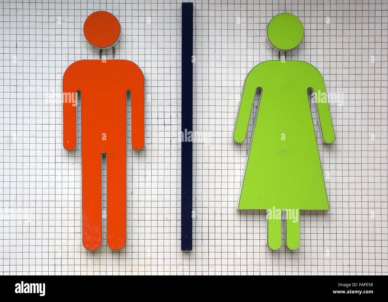 Islamic toilet sign with long skirt Stock Photo