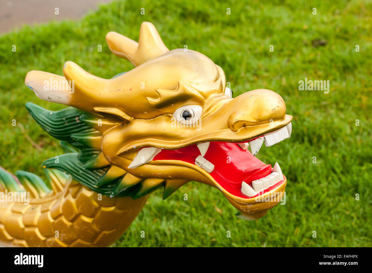 Close up of a traditional golden dragon boat head Stock Photo