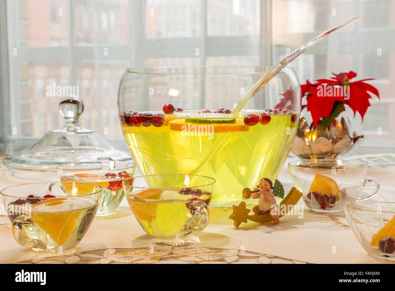 Crystal punch bowl with Christmas decorations, HDR Stock Photo Alamy