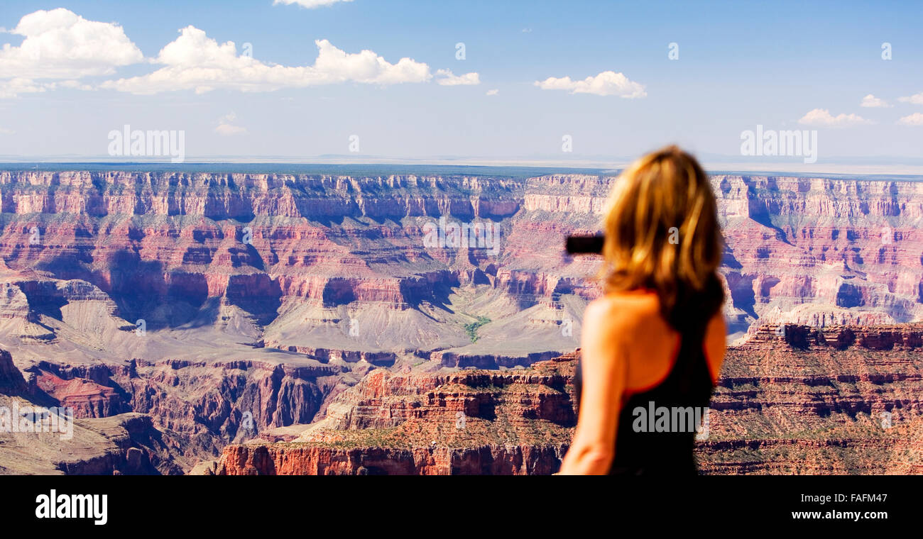 Woman taking photographs of Grand Canyon, Arizona, USA Stock Photo - Alamy