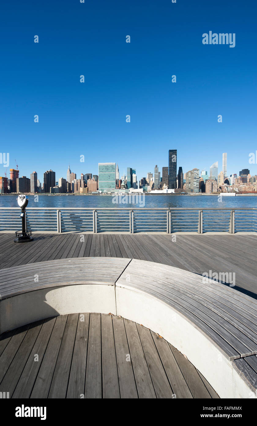 Scenic skyline view of Midtown Manhattan from a wood deck across the ...