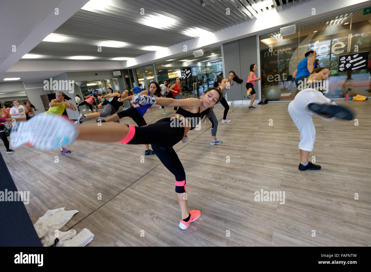 Women during Body Combat fitness class at the gym Stock Photo