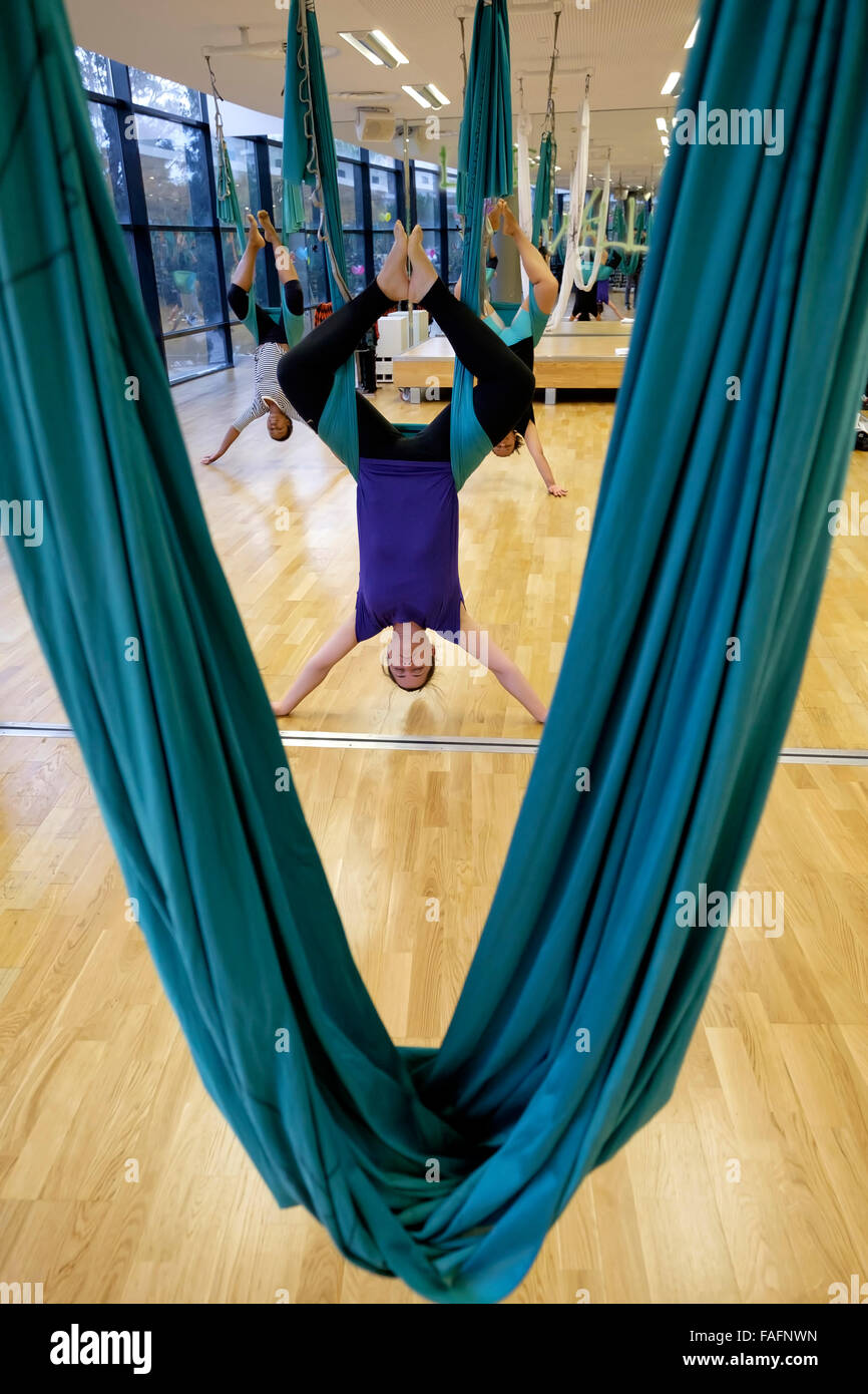 Antigravity aerial yoga class at the gym Stock Photo