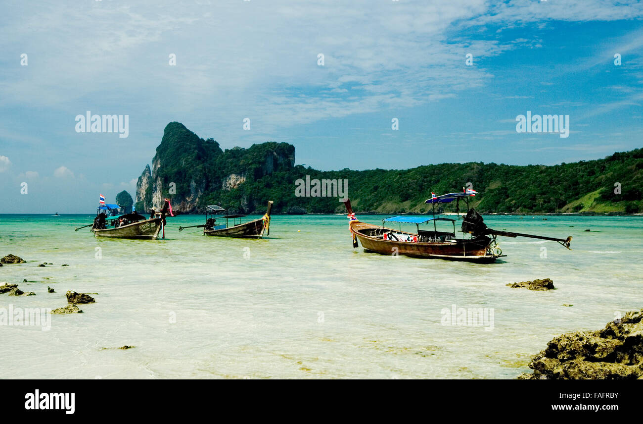 fishing boats grounded waiting for tide. Thailand Stock Photo