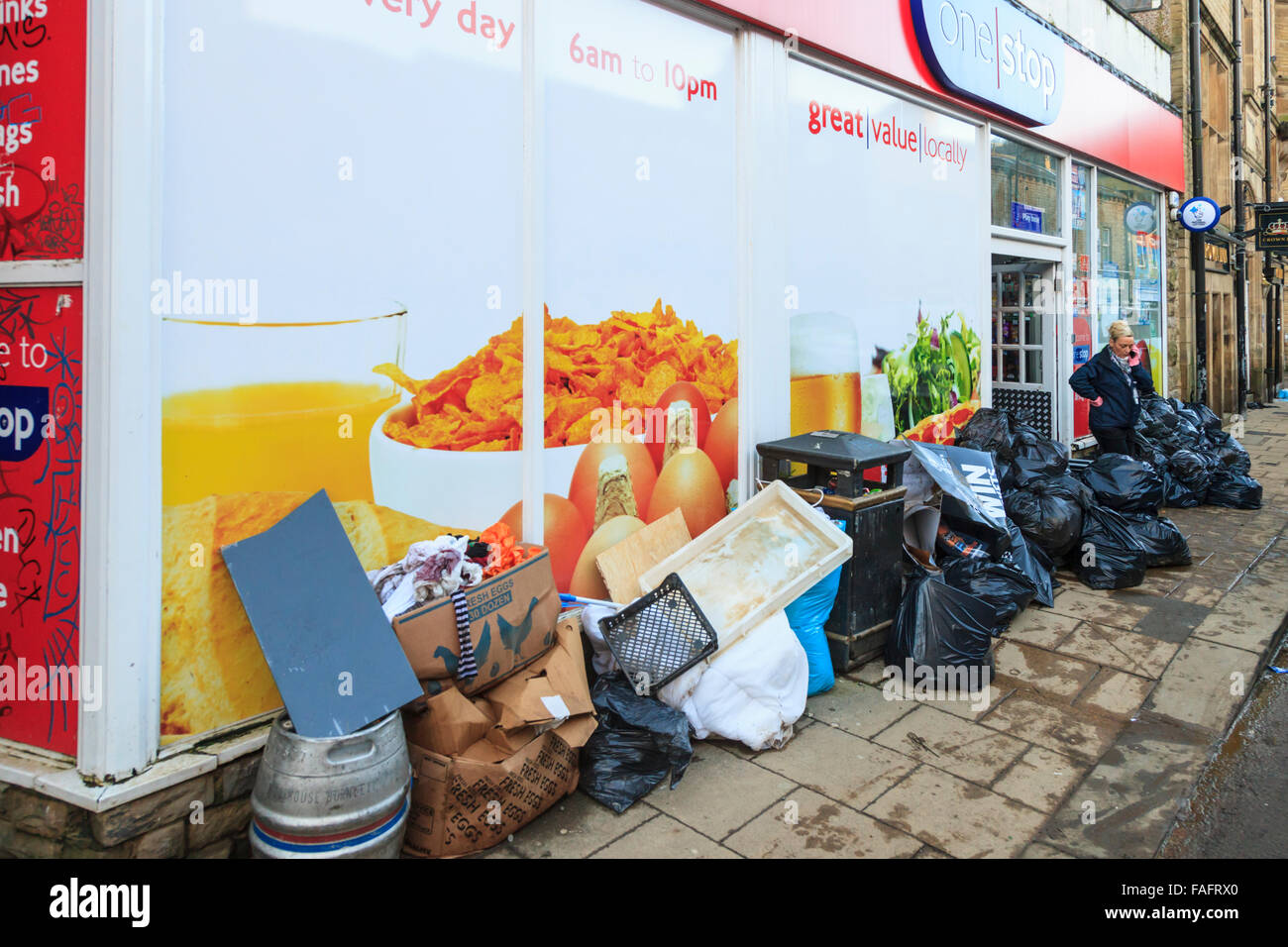 Hebden Bridge, UK. 29th Dec, 2015. Contents of a shop piled up on the street in Hebden Bridge two days after the Boxing Day floods Credit:  Graham Hardy/Alamy Live News Stock Photo