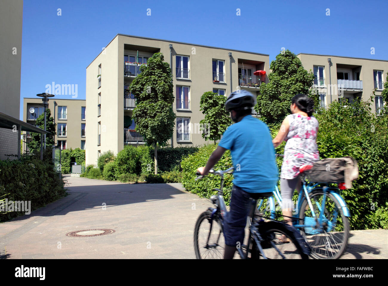 A pedestrian and bike route within the car-free settlement of Gartensiedlung Weissenburg, Muenster, Germany. Stock Photo